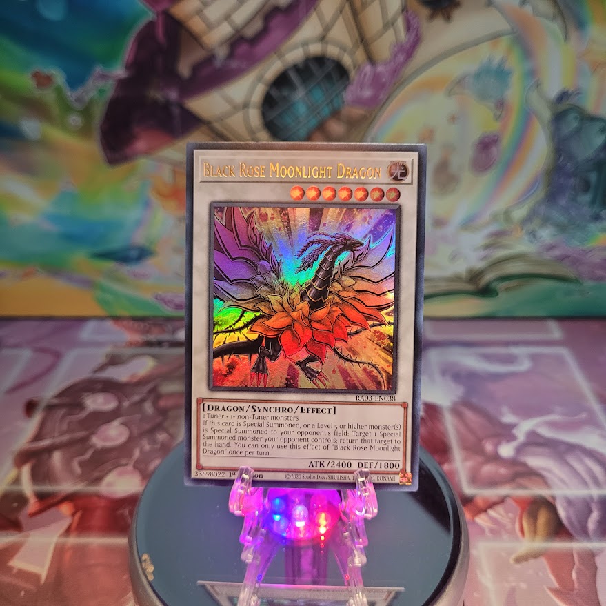 An Ultra Rare "Black Rose Moonlight Dragon" card from the Yugioh Set: Quarter Century Bonanza (RA03).