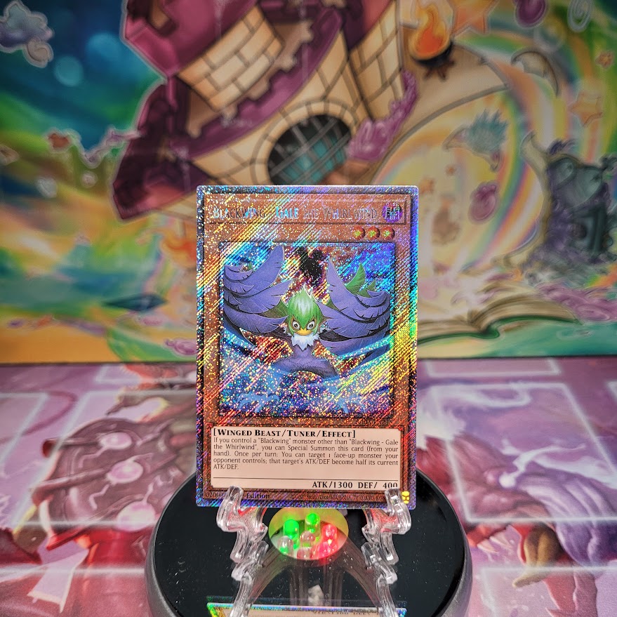 A Platinum Secret Rare "Blackwing - Gale the Whirlwind" card from the Yugioh Set: Quarter Century Bonanza (RA03).