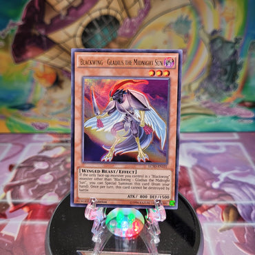 An Ultra Rare "Blackwing - Gladius the Midnight Sun" card from the Yugioh set: Legendary Collection 5D's.