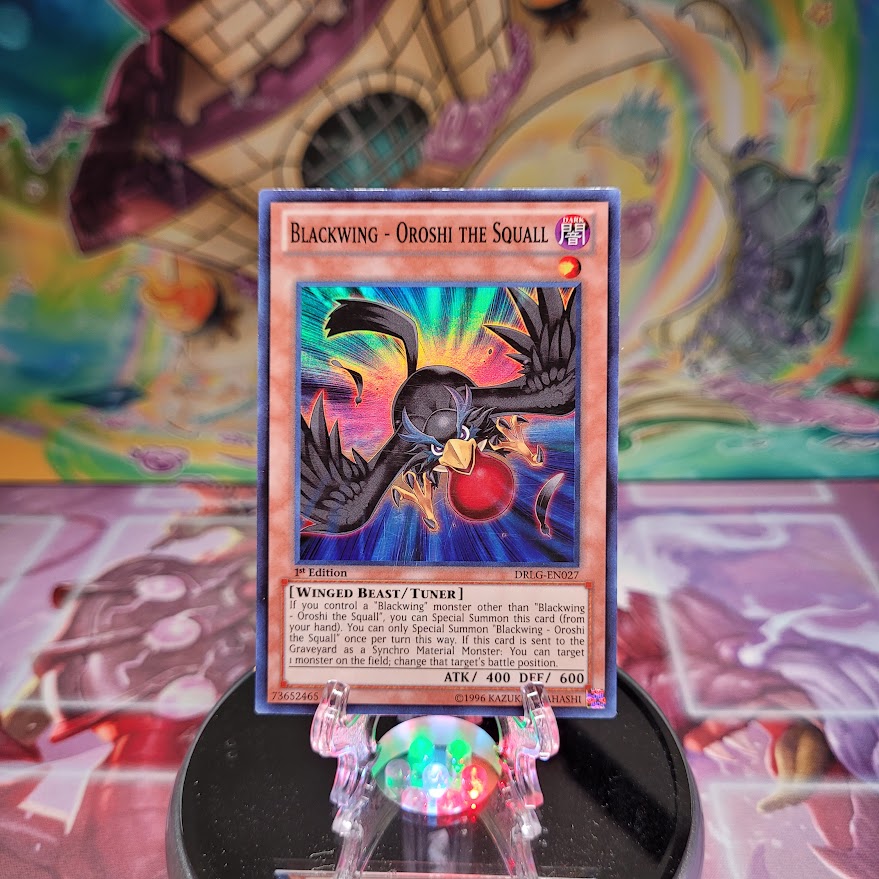 A Super Rare "Blackwing - Oroshi the Squall" card from the Yugioh set: Dragons of Legend.