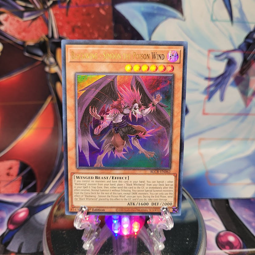 An Ultra Rare "Blackwing - Simoon the Poison Wind" card from the Yugioh Set: Battles of Legend: Crystal Revenge.