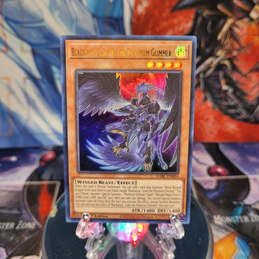 An Ultra Rare "Blackwing - Sudri the Phantom Glimmer" card from the Yugioh Set: Darkwing Blast.