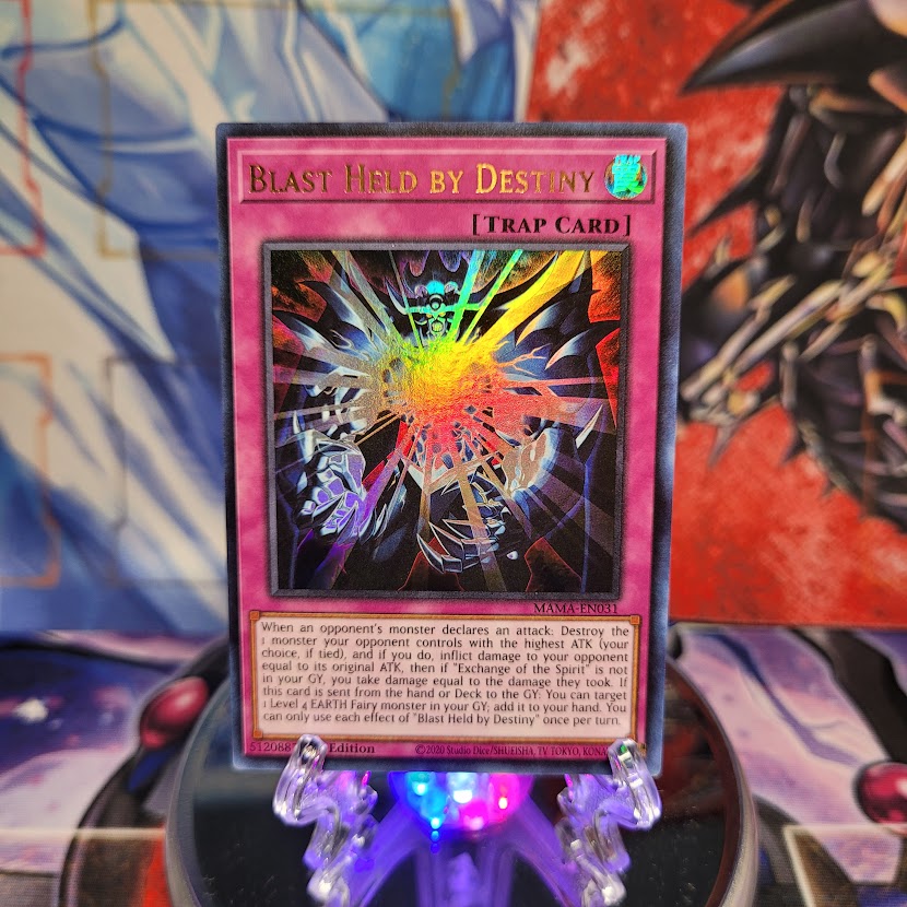 An Ultra Rare "Blast Held By Destiny" card from the Yugioh Set: Magnificent Mavens.