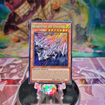 A Secret Rare "Blue-Eyes Jet Dragon" card from the Yugioh Set: Rarity Collection 2 (RA02).