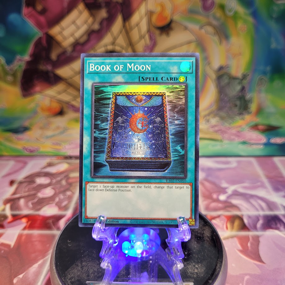 A Super Rare "Book of Moon" card from the Yugioh Set: Rarity Collection 2 (RA02).