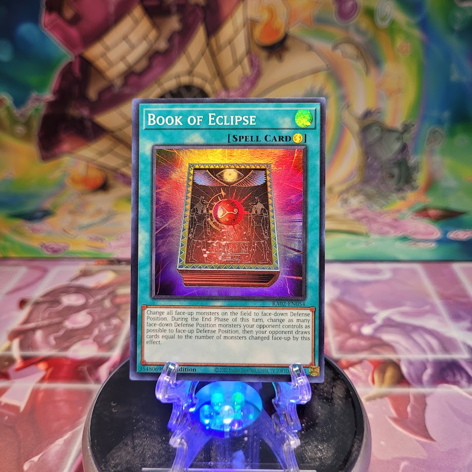 A Super Rare "Book of Eclipse" card from the Yugioh Set: Rarity Collection 2 (RA02).