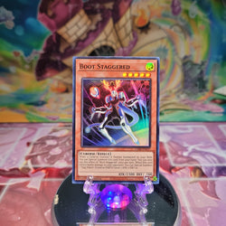 A Super Rare "Boot Staggered" card from the Yugioh Set: Crossover Breakers.