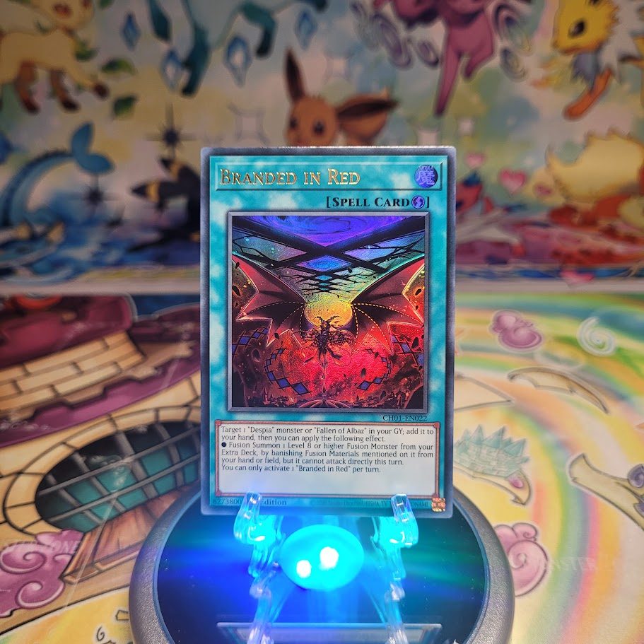 An Ultra Rare "Branded in Red" card from the Yugioh Structure Deck: The Fallen & The Virtuous (CH01).