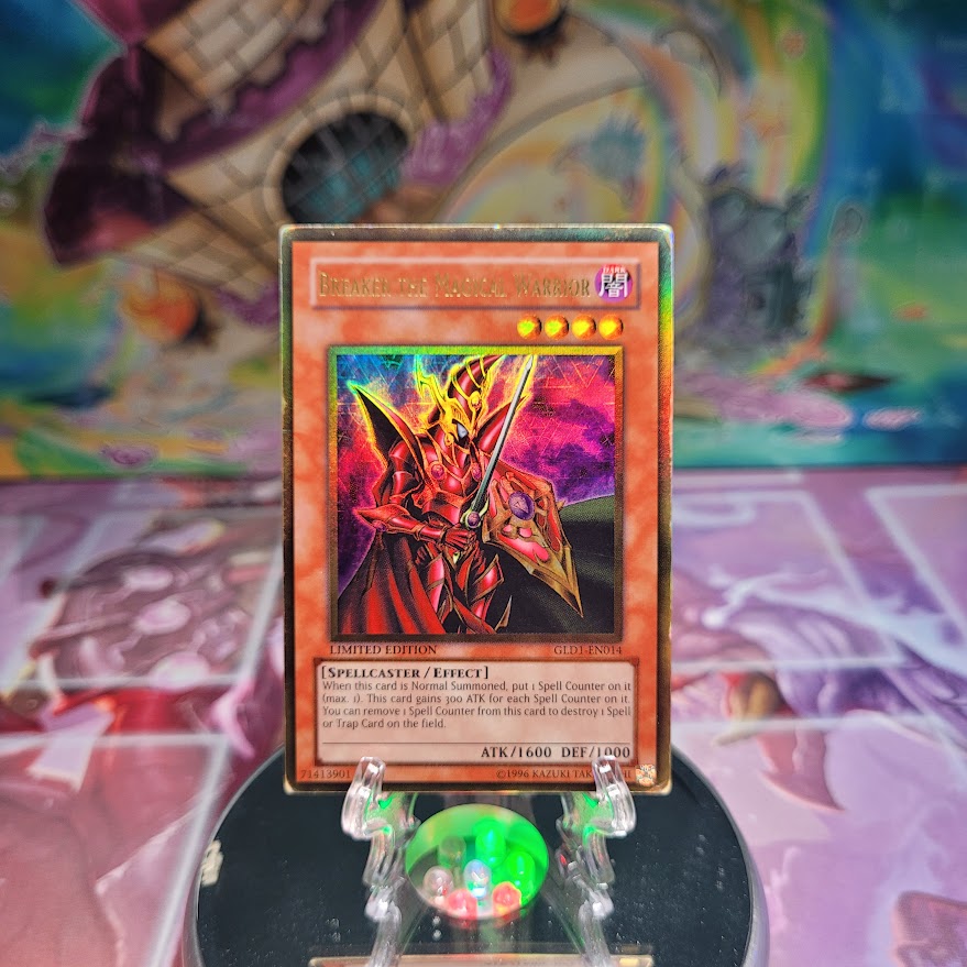 A Gold Rare "Breaker the Magical Warrior" card from the Yugioh Set: Gold Series 1.