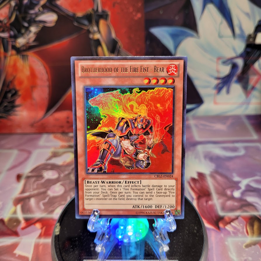 An Ultra Rare "Brotherhood of the Fire Fist - Bear" card from the Yugioh Set: Cosmo Blazer (CBLZ).