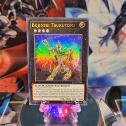 An Ultra Rare "Bujintei Tsukuyomi" card from the Yugioh Set: Battles of Legend: Light's Revenge.