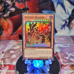 A Super Rare "Burning Dragon" card from the Yugioh Set: Age of Overlord.