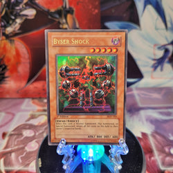 An Ultra Rare "Byser Shock" card from the Yugioh Set: Pharaonic Guardian.