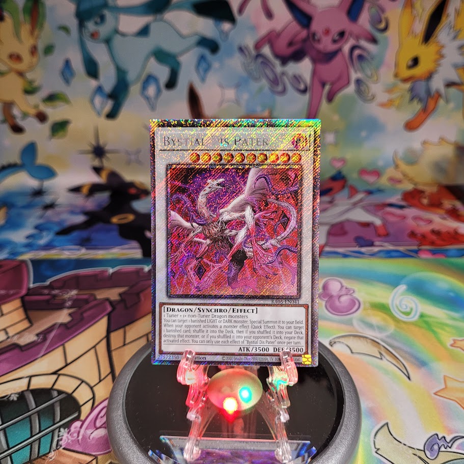 A Platinum Secret Rare "Bystial Dis Pater" card from the Yugioh Set: Rarity Collection 5 (RA05).