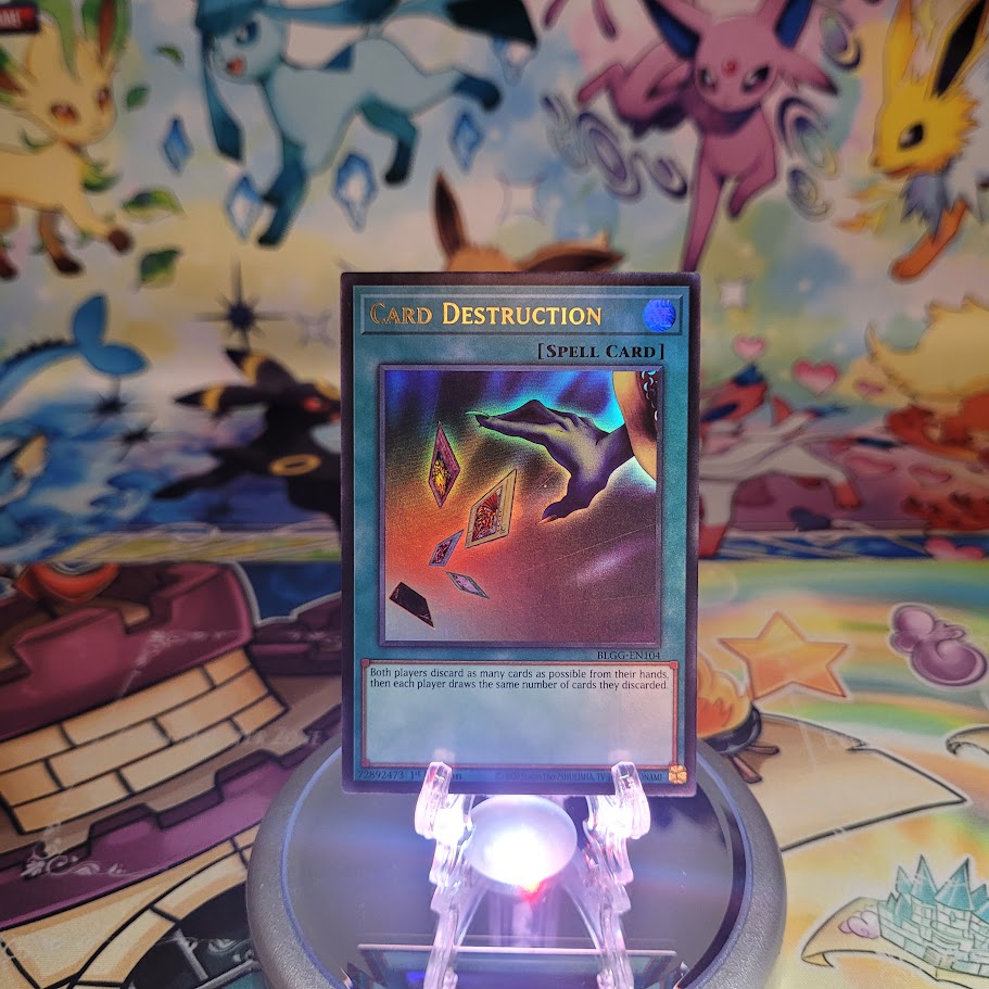 An Ultra Rare "Card Destruction" card from the Yugioh Set: Battles of Legend: Glorious Gallery (BLGG).