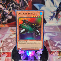 A Super Rare "Catapult Turtle" card from the Yugioh Set: Metal Raiders (MRD).