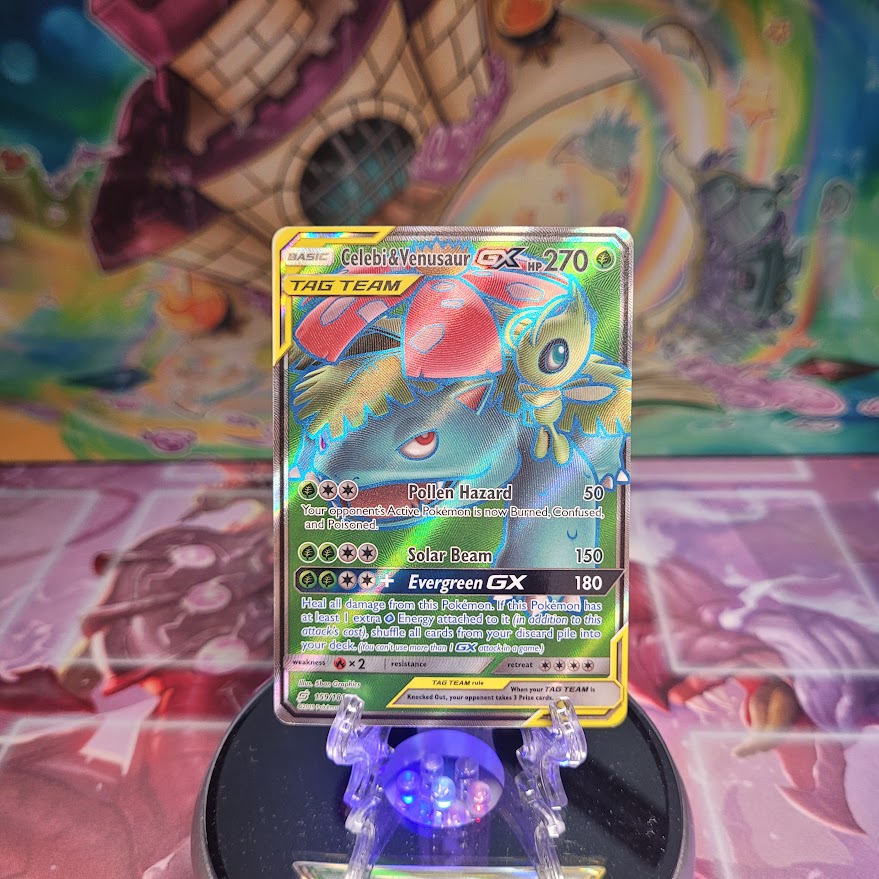 An Ultra Rare Full Art "Celebi & Venusaur Gx" (159/181) card from the Pokemon Set: Sun and Moon: Team Up.