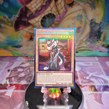 A Prismatic Collector's Rare "Chamber Dragonmaid" card from the Yugioh Set: Quarter Century Stampede (RA04).
