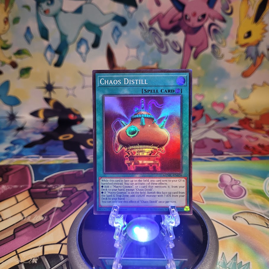 A Super Rare "Chaos Distill" card from the Yugioh Set: Maze of Muertos (MZMU).