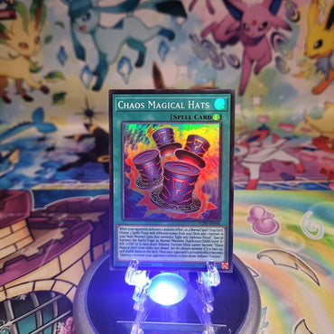 A Super Rare “Chaos Magical Hats” card from the Yugioh Set: Chaos Origins (CORI).