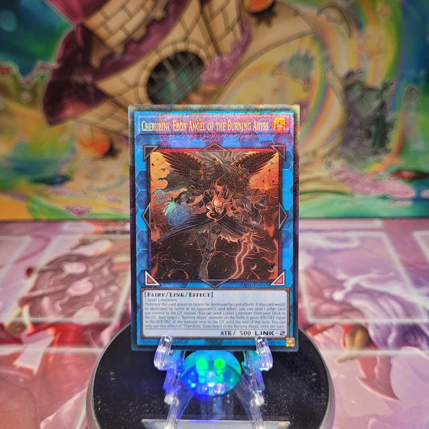  A Prismatic Collector's Rare "Cherubini, Ebon Angel of the Burning Abyss" card from the Yugioh Set: Rarity Collection 1 (RA01).