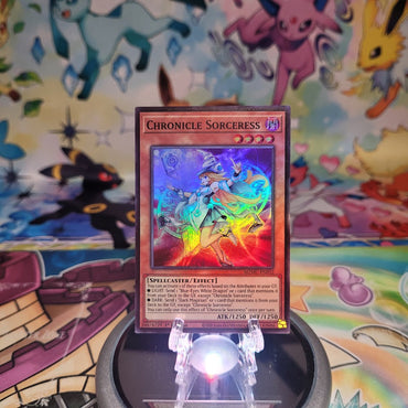 A Super Rare "Chronicle Sorceress" card from the Yugioh Set: Maze of Muertos (MZMU).