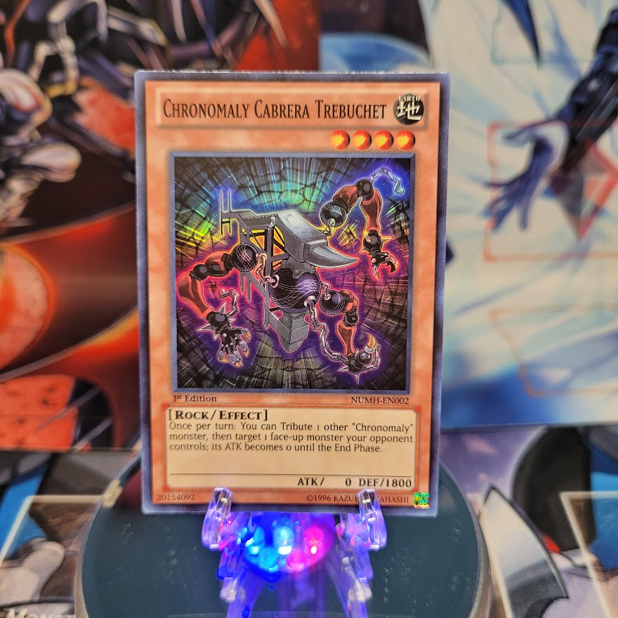 A Super Rare "Chronomaly Cabrera Trebuchet" card from the Yugioh Set: Number Hunters.