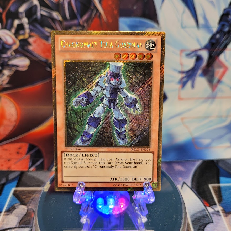 A Gold Secret Rare "Chronomaly Tula Guardian" card from the Yugioh Set: Premium Gold: Return of the Bling.