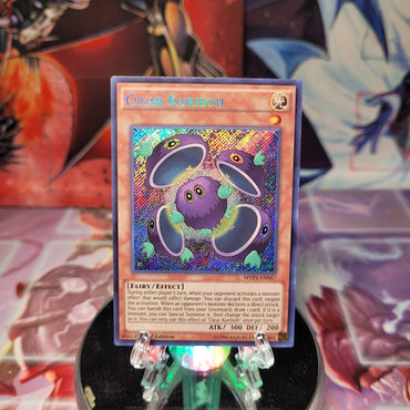 A Secret Rare "Clear Kuriboh" card from the Yugioh Set: The Dark Side of Dimensions: Movie Pack Secret Edition (MVP1).