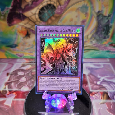 A Super Rare "Clorless, Chaos King of Dark World" card from the Yugioh Set: Maze of Millennia (MZMI).