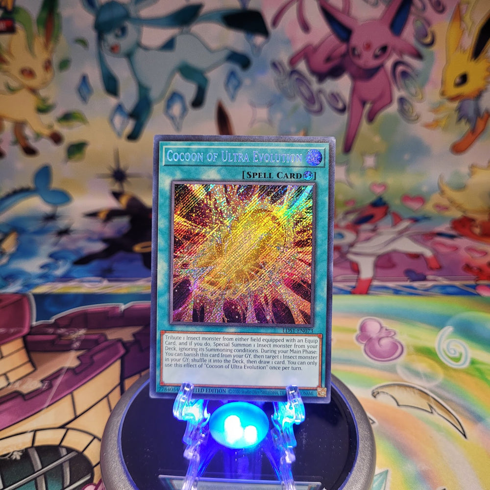 A Secret Rare "Cocoon of Ultra Evolution" card from the Yugioh Set: Legendary Duelists: Season 1 (LDS1)