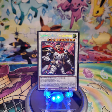 A Secret Rare "Commander Souza - Swordmaster" card from the Yugioh Legendary Modern Decks (L26D).