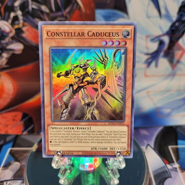 A Super Rare "Constellar Caduceus" card from the Yugioh Set: Blazing Vortex.