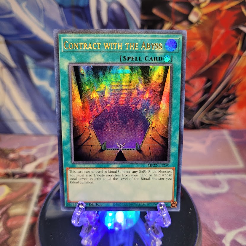 An Ultra Rare "Contract with the Abyss" card from the Yugioh 2022 Tin of the Pharaoh's Gods Set (MP22).