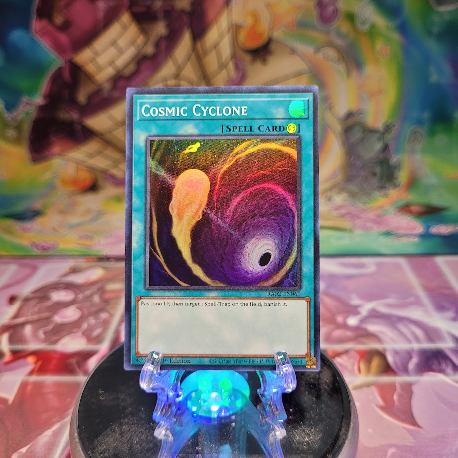 A Super Rare "Cosmic Cyclone" card from the Yugioh Set: Rarity Collection 2 (RA02).