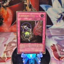 An Ultimate Rare "Covering Fire" card from the Yugioh Set: Rise of Destiny (RDS).