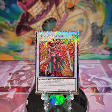 A Platinum Secret Rare "Crimson Blader" card from the Yugioh Set: Quarter Century Stampede (RA04).