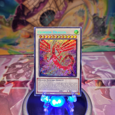 A Secret Rare "Crimson Dragon" card from the Yugioh Set: Quarter Century Stampede (RA04).
