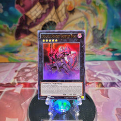 An Ultra Rare "Crimson Knight Vampire Bram" card from the Yugioh 2014 Mega-Tin Mega Pack.