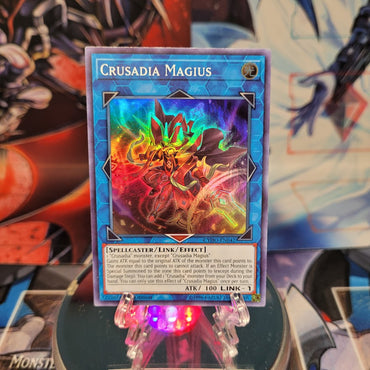 A Super Rare "Crusadia Magius" card from the Yugioh Set: Cybernetic Horizon.