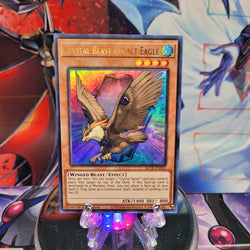 An Ultra Rare "Crystal Beast Cobalt Eagle" card from the Yugioh Set: Battles of Legend: Crystal Revenge.