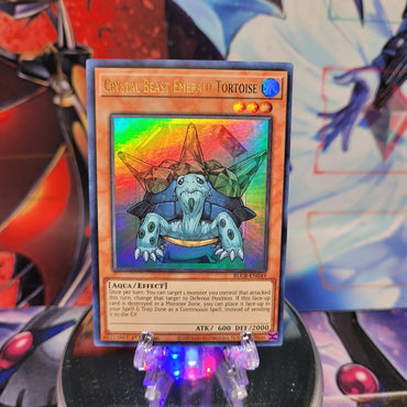 An Ultra Rare "Crystal Beast Emerald Tortoise" card from the Yugioh Set: Battles of Legend: Crystal Revenge.