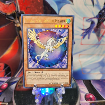 An Ultra Rare "Crystal Beast Sapphire Pegasus" card from the Yugioh Set: Battles of Legend: Crystal Revenge.