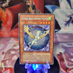 A Secret Rare "Crystal Beast Sapphire Pegasus" card from the Yugioh 2007 Collectors Tins.