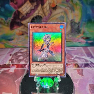 A Super Rare "Crystal Girl" card from the Yugioh Set: King's Court.