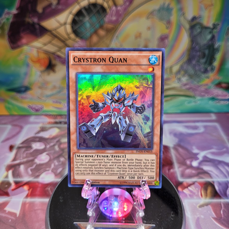 A Super Rare "Crystron Quan" card from the Yugioh Set: Invasion: Vengeance.