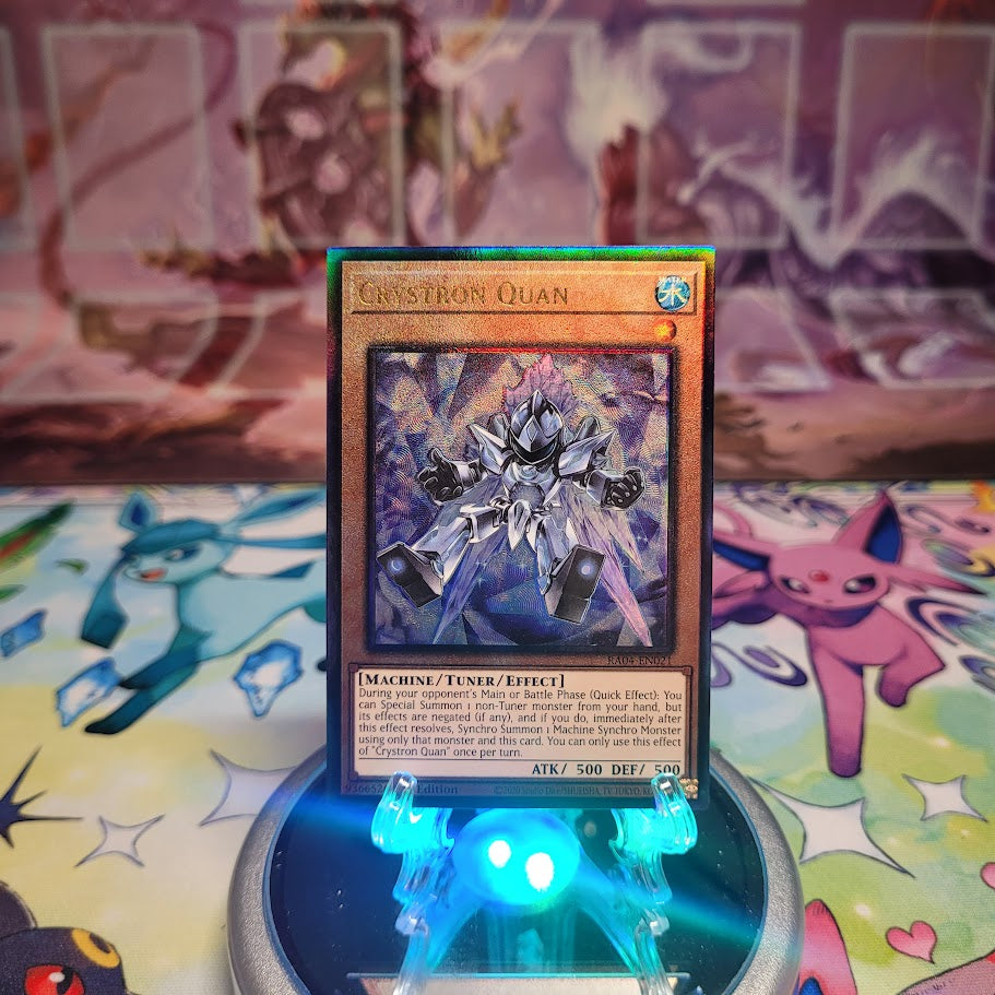 A Prismatic Ultimate Rare "Crystron Quan" card from the Yugioh Set: Quarter Century Stampede (RA04).