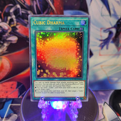 An Ultra Rare "Cubic Dharma" card from the Yugioh Set: Duel Overload.