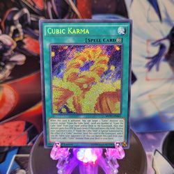 A Secret Rare "Cubic Karma" card from the Yugioh Set: The Dark Side of Dimensions Movie Pack: Secret Edition.