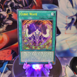 A Secret Rare "Cubic Wave" card from the Yugioh Set: The Dark Side of Dimensions Movie Pack: Secret Edition.